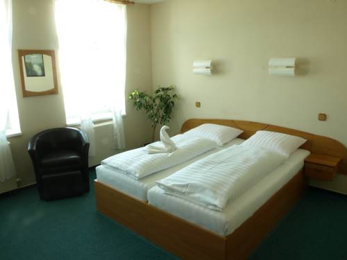 Imagen de la habitación del Hotel U Labutě. Foto 9