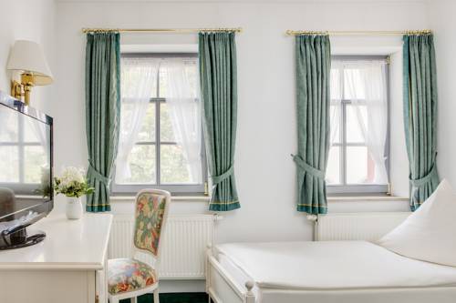 Imagen de la habitación del Hotel Und Caf&eacute; Am Markt Residenz. Foto 4