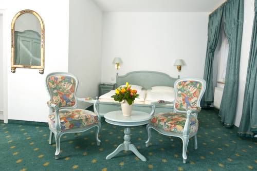 Imagen de la habitación del Hotel Und Caf&eacute; Am Markt Residenz. Foto 5