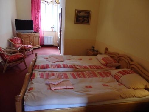 Imagen de la habitación del Hotel Und Restaurant Peking. Foto 10