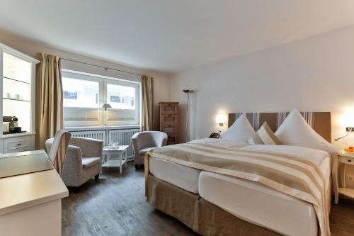 Imagen de la habitación del Hotel Uthland. Foto 7