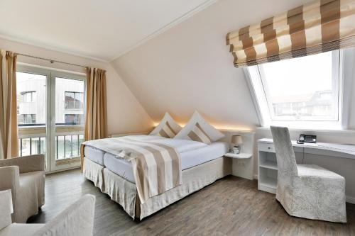 Imagen de la habitación del Hotel Uthland. Foto 8