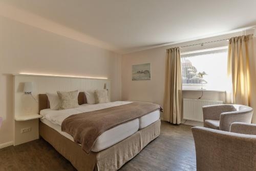 Imagen de la habitación del Hotel Uthland. Foto 10
