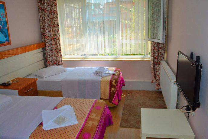 Imagen de la habitación del Hotel &Uuml;lke. Foto 9