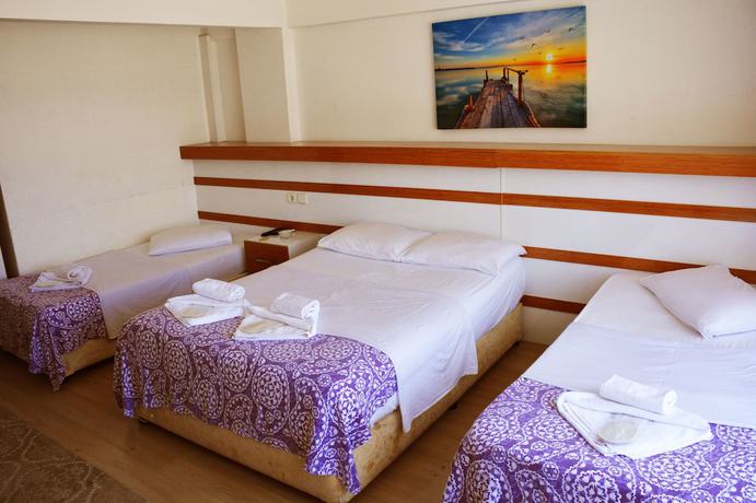 Imagen de la habitación del Hotel &Uuml;lke. Foto 13