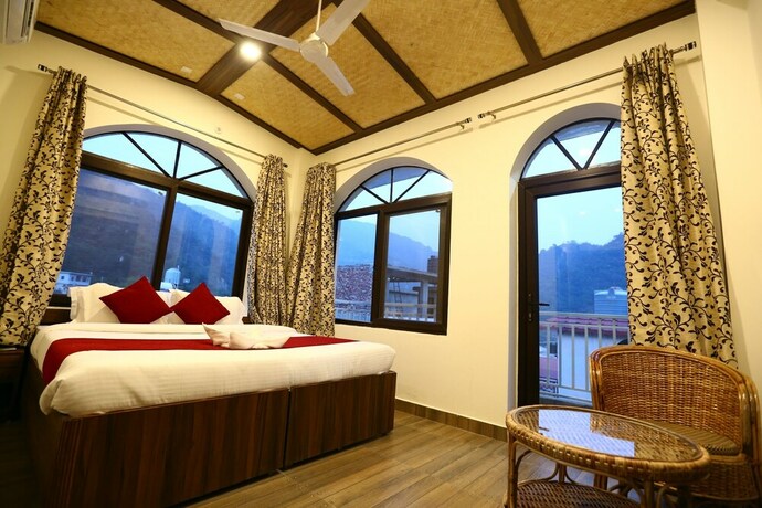 Imagen de la habitación del Hotel Vedas Tapovan. Foto 11