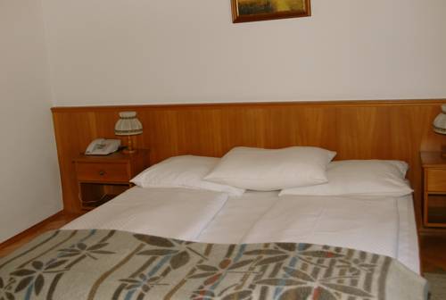 Imagen de la habitación del Hotel Velden Bacherlwirt. Foto 16