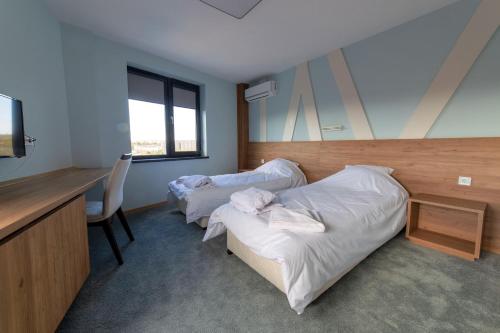 Imagen de la habitación del Hotel Verticalplus. Foto 20