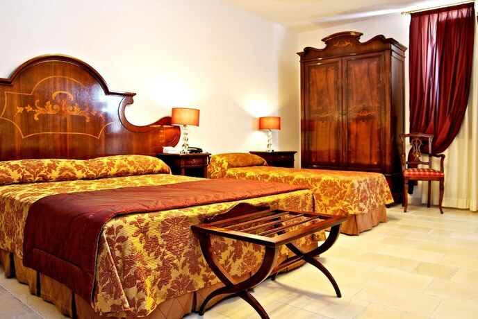 Imagen de la habitación del Hotel Vico Regio. Foto 19