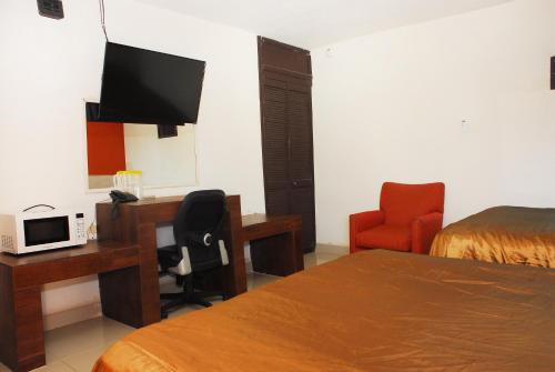 Imagen de la habitación del Hotel Villa Del Sol. Foto 9