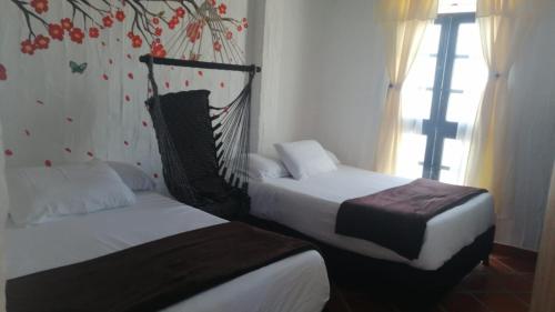 Imagen de la habitación del Hotel Villa Luisa en Villa de Leyva. Foto 15