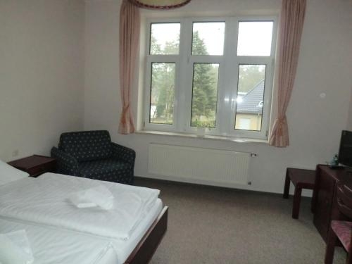 Imagen de la habitación del Hotel Villa Raueneck. Foto 10