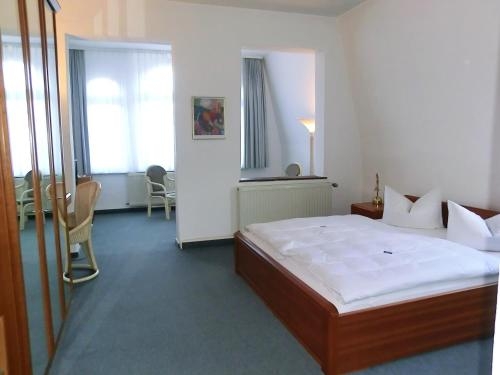 Imagen de la habitación del Hotel Villa Strandrose. Foto 9