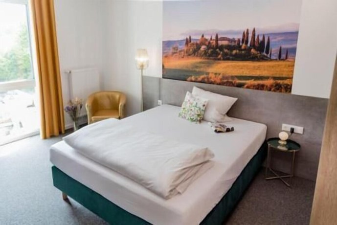 Imagen de la habitación del Hotel Villa Toskana. Foto 13