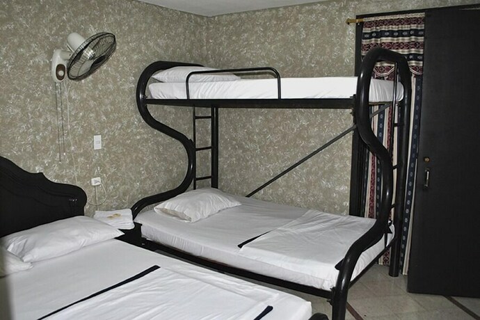 Imagen de la habitación del Hotel Villas Del Estadio. Foto 30