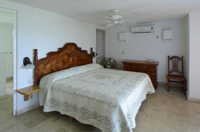 Imagen de la habitación del Hotel Villas Los Angeles. Foto 7