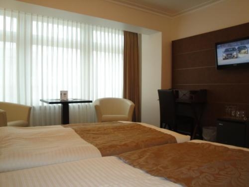 Imagen de la habitación del Hotel Von Stephan. Foto 10