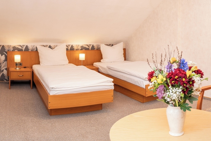 Imagen de la habitación del Hotel Waldhaus Waltershausen. Foto 12
