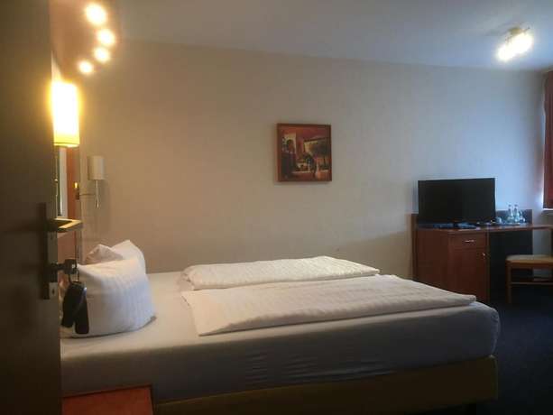 Imagen de la habitación del Hotel Walker. Foto 7
