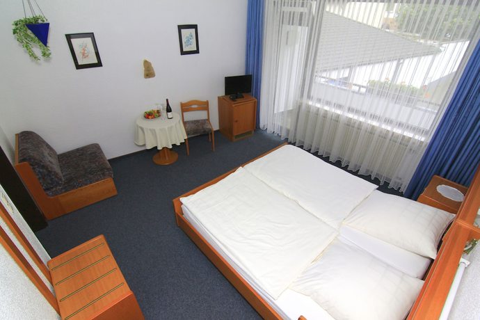 Imagen de la habitación del Hotel Weinstube Klasen. Foto 11