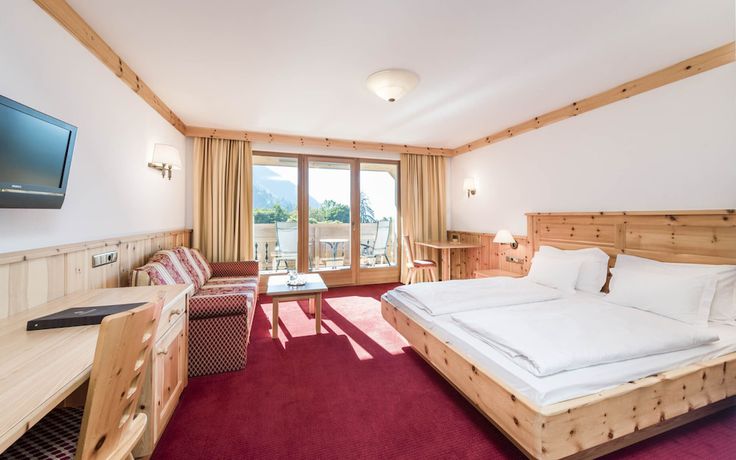 Imagen de la habitación del Hotel Weisses Rössl - Cavallino Bianco. Foto 8