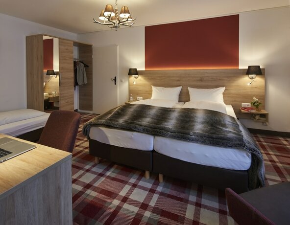 Imagen de la habitación del Hotel Wei&szlig;br&auml;u. Foto 13
