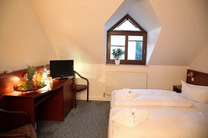 Imagen de la habitación del Hotel Wei&szlig;e Elster. Foto 16