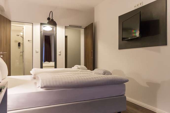 Imagen de la habitación del Hotel West. Foto 5