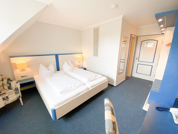 Imagen de la habitación del Hotel Wikingerhof. Foto 7
