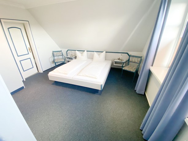 Imagen de la habitación del Hotel Wikingerhof. Foto 13