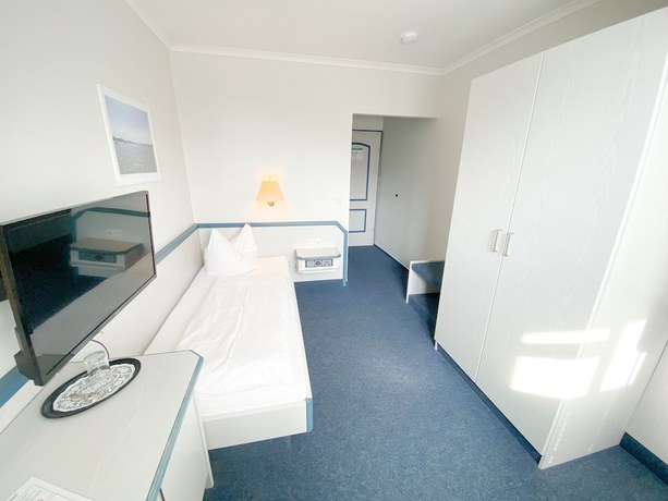 Imagen de la habitación del Hotel Wikingerhof. Foto 17
