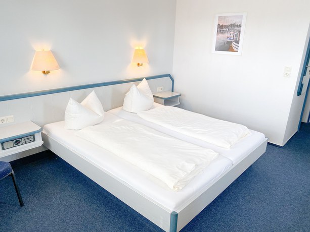 Imagen de la habitación del Hotel Wikingerhof. Foto 18