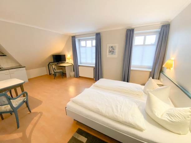 Imagen de la habitación del Hotel Wikingerhof. Foto 19
