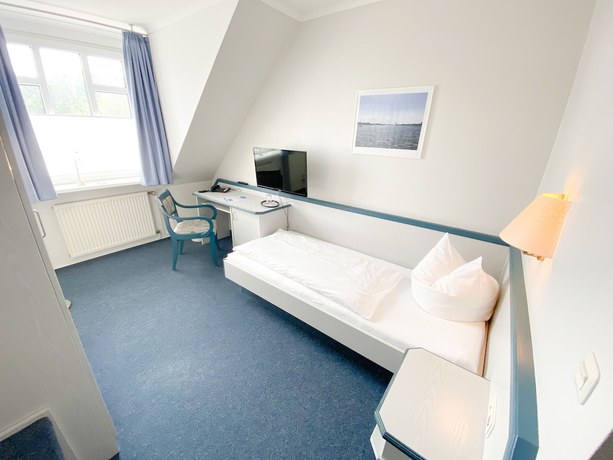 Imagen de la habitación del Hotel Wikingerhof. Foto 20