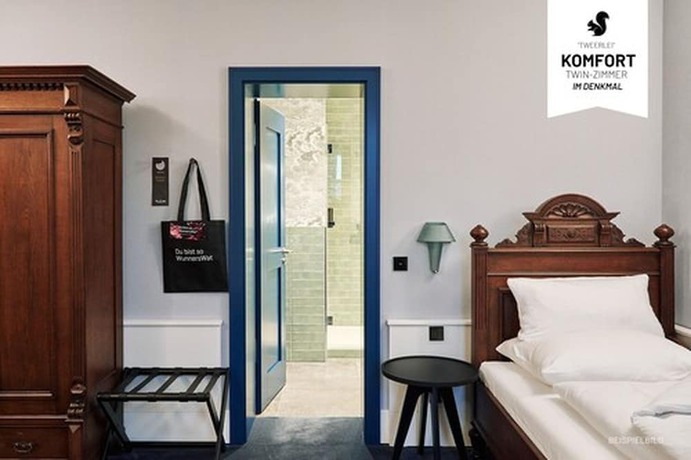 Imagen de la habitación del Hotel WunnersWat. Foto 8