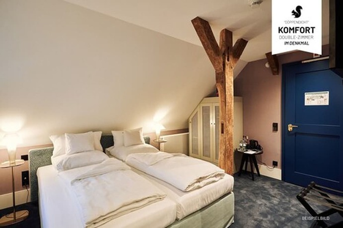 Imagen de la habitación del Hotel WunnersWat. Foto 13