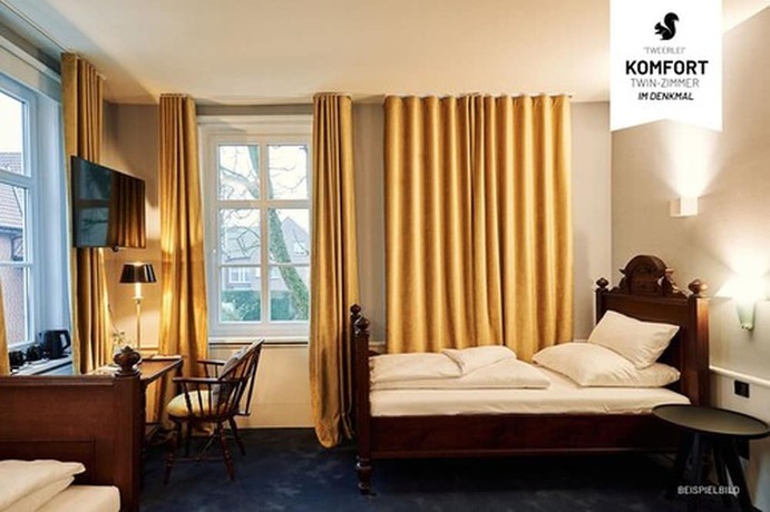 Imagen de la habitación del Hotel WunnersWat. Foto 14