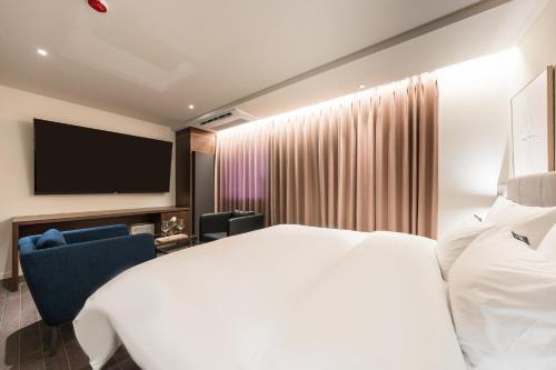 Imagen de la habitación del Hotel Yaja Mokpo Peace Square. Foto 16
