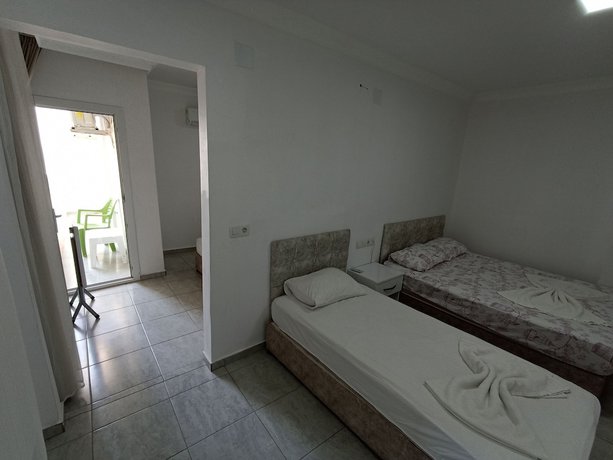 Imagen de la habitación del Hotel Yaka Inn. Foto 11