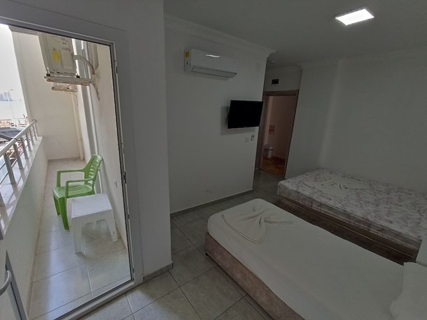 Imagen de la habitación del Hotel Yaka Inn. Foto 15