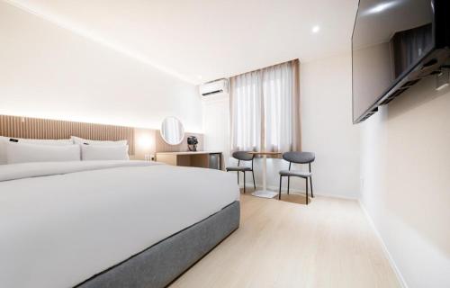 Imagen de la habitación del Hotel Yam Sangmu. Foto 18