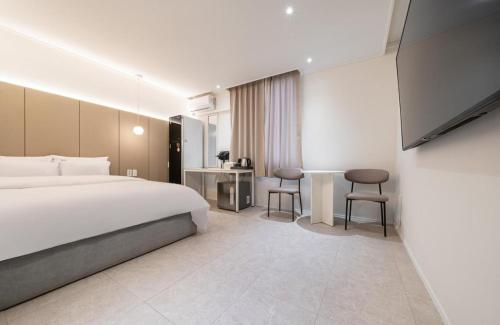 Imagen de la habitación del Hotel Yam Sangmu. Foto 19