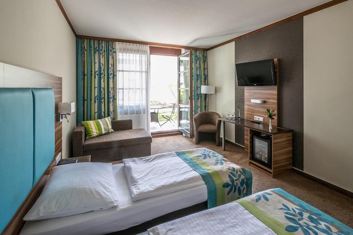 Imagen de la habitación del Hotel am Krone Park. Foto 13