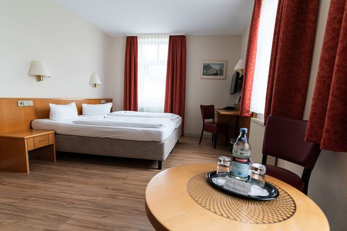 Imagen de la habitación del Hotel am Stadthaus. Foto 8