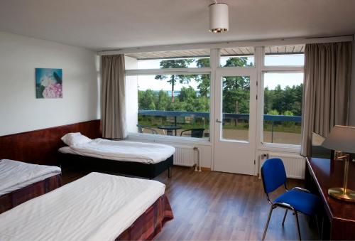 Imagen de la habitación del Hotel & Hostel Tallukka. Foto 6