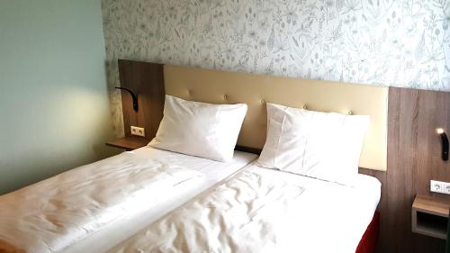 Imagen de la habitación del Hotel & Restaurant Hubertus Sehnde. Foto 18
