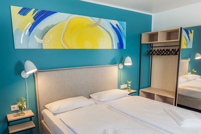 Imagen de la habitación del Hotel and Caf&eacute; M&uuml;hlengl&uuml;ck. Foto 8