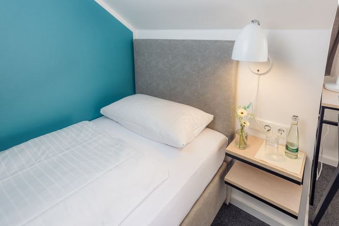 Imagen de la habitación del Hotel and Caf&eacute; M&uuml;hlengl&uuml;ck. Foto 11