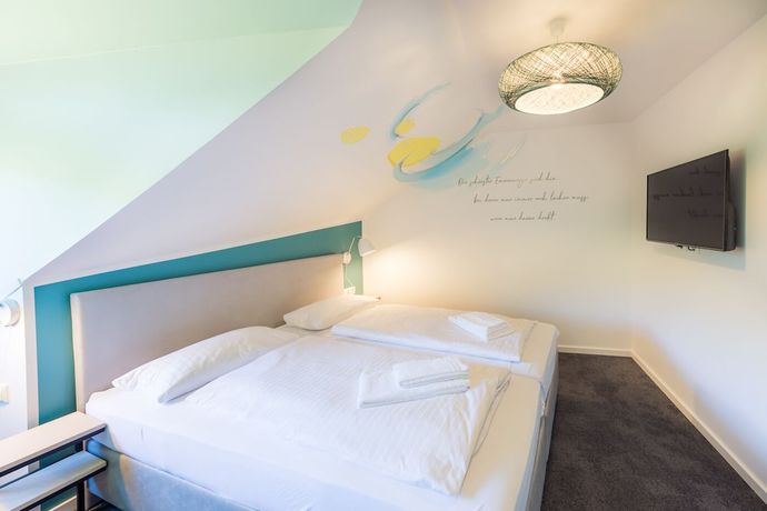 Imagen de la habitación del Hotel and Caf&eacute; M&uuml;hlengl&uuml;ck. Foto 15