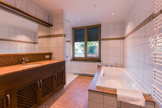 Imagen de la habitación del Hotel and Gastst&auml;tte Zum Erdinger Wei&szlig;br&auml;u. Foto 8